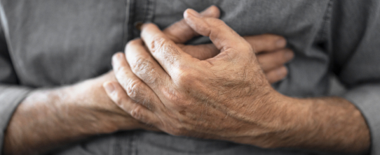 a photo of a person with their arms folded across their chest