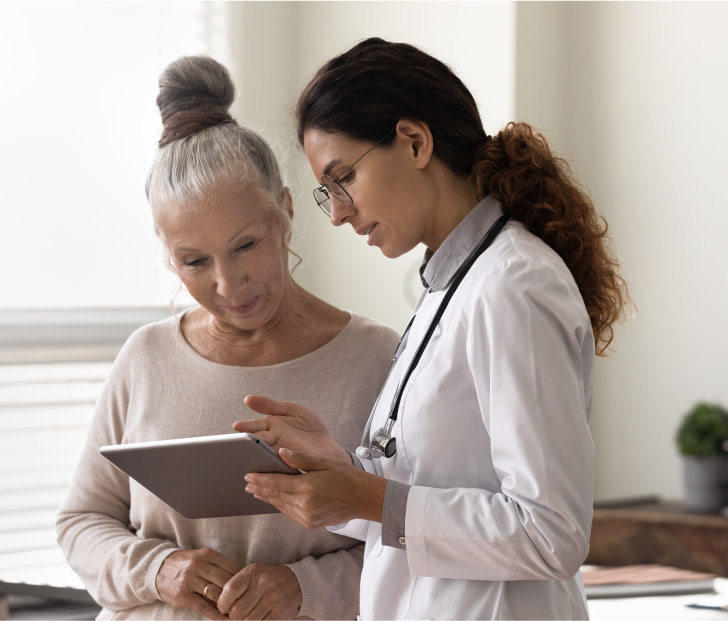 a photo of a doctor consulting with a patient